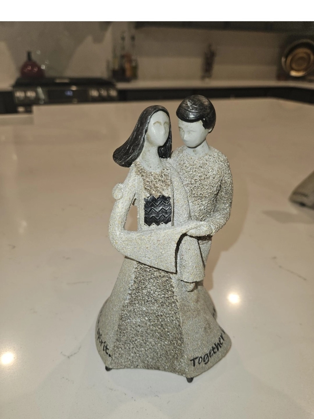 "United" Art Stone sculpture by Carson Home Accents.